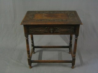 A Victorian carved oak side table fitted a drawer, raised on turned and block supports 27"