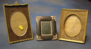 A gilt metal easel photograph frame 7" and 2 other photograph frames