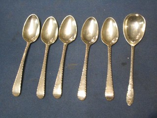 A set of 5 George IV silver Old English pattern tea spoons with bright cut decoration, London 1823 and a silver preserve spoon
