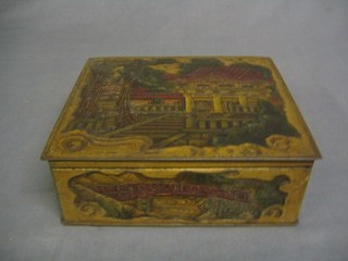 An embossed biscuit tin containing a collection of various coins