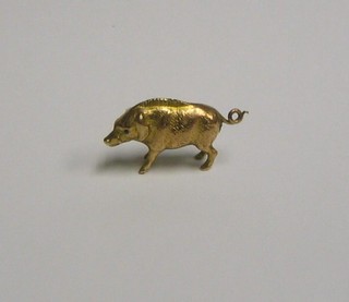A gold charm in the form of a wild boar
