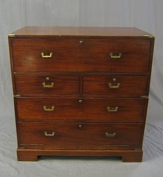 A 19th Century mahogany military chest fitted a secretaire drawer above 2 short and 1 long drawers and recess, raised on bracket feet 40"
