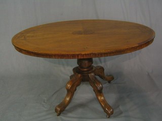 A Victorian oval inlaid walnutwood Loo table raised on a carved bulbous turned support 50"