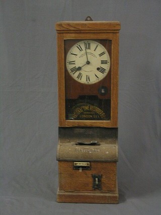 A clocking in clock by the National Time Recorder Co