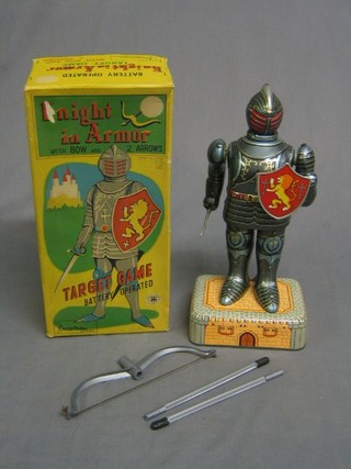A 1950's/60's tin plate Knight in Armour figure with bow and 2 arrows by Cragstan Toys no. 741, boxed
