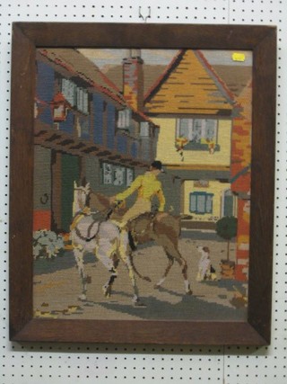 A Berlin woolwork panel depicting huntsman with 2 horses and hound in a courtyard 21" x 17" contained in an oak frame