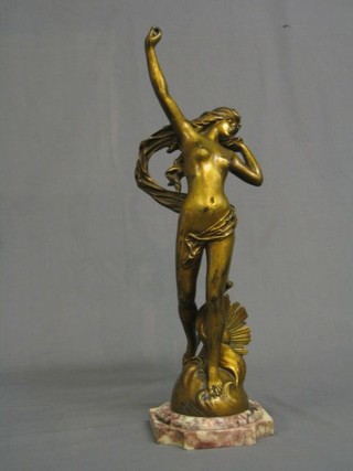 E. Droudt, an Art Deco gilt bronze figure of a standing semi-naked lady with sunburst at her feet, raised on a shaped marble base 22"