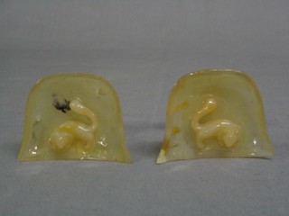 A pair of Oriental carved hardstone crumb scoops decorated squirrels 3"