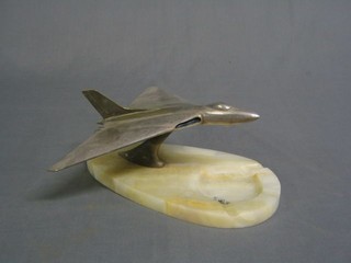 A 1950's chromium plated and marble ashtray in the form of a jet aircraft