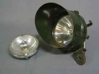 A large spot light removed from a Scammel Diamond T transporter and 1 other car headlight