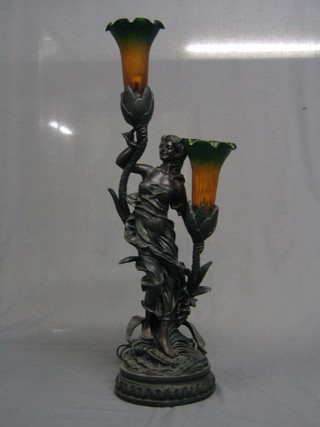 An Art Nouveau style resin table lamp in the form of a lady and 2 coloured glass trumpets 28"