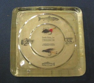 A Hardy Bros square ashtray with back paper decorated 2 flies and hooks 4"