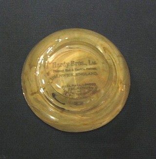 A Hardy Bros circular advertising glass paperweight set a fly 3"