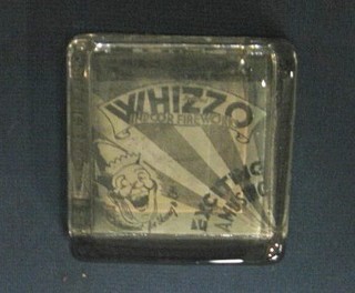 A Whizzo Indcor Fireworks square advertising glass paperweight 3"