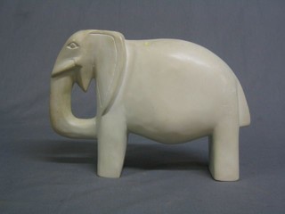 A carved stone figure of an elephant 8"
