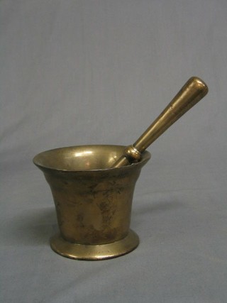 A 17th/18th Century brass mortar and pestle 