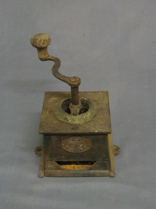 A Victorian iron coffee grinder by Kenrick & Sons