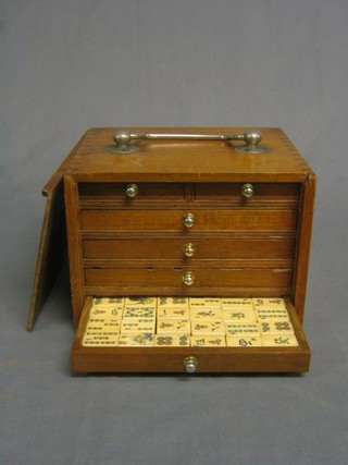 A bamboo and ivory Mahjong set, cased complete with instructions