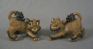 A pair of 19th/20th Century Oriental "terracotta" figures of Dogs of Fo 8"