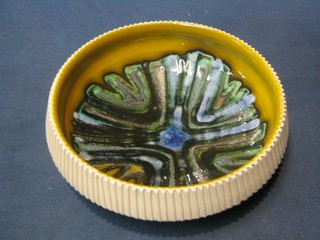 A 1960's circular Poole Pottery bowl, the base marked 37, 6"