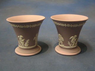 A pair of Wedgwood pink Jasperware trumpet shaped vases, bases marked 60 and impressed WH 3"