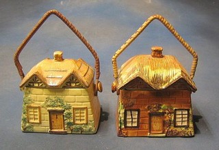 A Kefle St pottery biscuit barrel in the form of a cottage and a do. Prices Bros. pottery biscuit barrel
