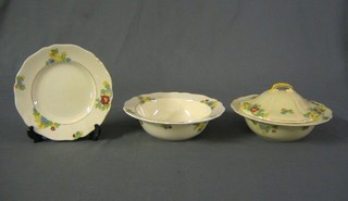 A 17 piece Royal Doulton Minden pattern dinner service with 2 circular vegetable tureens (1 cracked), a circular bowl, 2 bowls (1 cracked), 8 side plates (5 chipped), 4 - 5 1/2" tea plates