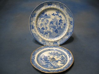 A 19th Century H Masons Ironstone blue and white plate with gilt banding decorated Willow pattern, the reverse impressed H Mason together with a 19th Century blue and white Willow pattern plate, reverse impressed M Mason 10"