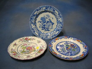 A 19th Century painted Ironstone blue and white plate decorated a bird 10", a Masons plate and an Ashworth Bros plate