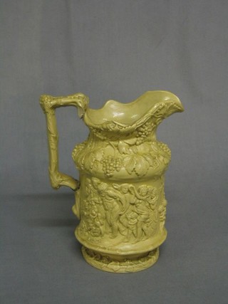 A 19th Century Ridgway style pottery jug decorated a bacchanalian scene (handle f and r) 8"