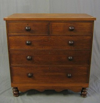 A Victorian oak chest of 2 short and 3 long drawers, raised on turned supports 44"