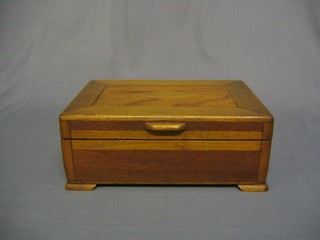 A hardwood needlework box with hinged lid 12" on bracket feet