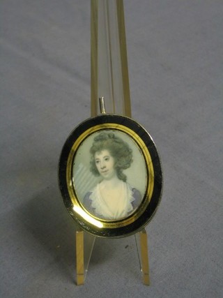 A 18th Century miniature on ivory head and shoulders portrait of a Lady contained in a silver mount 3" oval