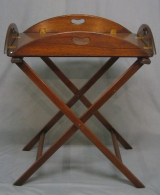 A mahogany folding butler's tray and stand