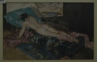 After Sir William Russell Flint, a coloured print "The Jade Cushion - Reclining Naked Lady on a Day Bed" 7" x 10" in a walnut frame