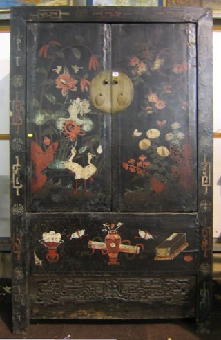 A 19th/20th Century Oriental lacquered cabinet enclosed by panelled doors on bracket feet 46"