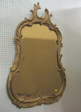 A 19th Century French bevelled plate wall mirror contained in Rococo style gilt frame 39"