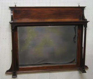 An Edwardian bevelled plate over mantel mirror contained in an inlaid mahogany frame supported by columns, 41"
