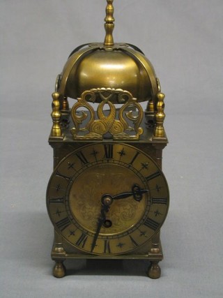 A 1950's Smiths 8 day reproduction brass lantern clock 11"