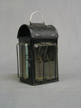 A 19th Century black painted coaching lamp