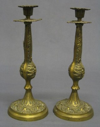 A pair of brass candlesticks 12"