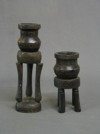 2 19th/20th Century Eastern carved bowls raised on turned supports 12" and 8"