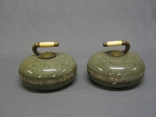 A pair of 19th Century granite, brass and ivory handled curling stones, marked JK
