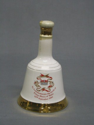 A 75cl bottle of Bells whiskey to commemorate the birth of Prince Henry 15 September 1984, contained in a porcelain Wade whiskey decanter