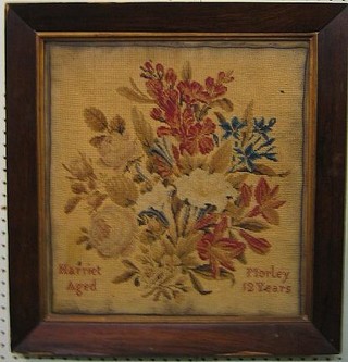 A Victorian Berlin wool work panel, study of flowers by Marriet Morley aged 12, 16" x 15" contained in a rosewood frame
