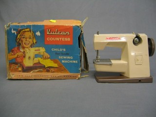 A childs Vulcan Countess sewing machine, boxed