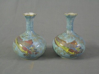 A pair of Wilton ware blue lustre club shaped vases decorated diving fish 6" (1 f and r)