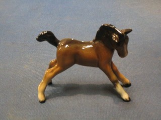 A Beswick figure of a standing foal 4"
