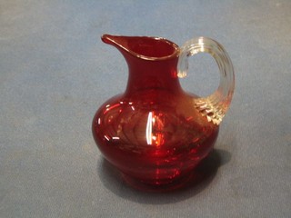 A red White Friars glass jug with clear glass handle 3"