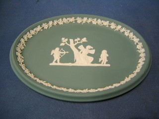 An oval green Wedgwood Jasperware tray, base marked Made in England 10"